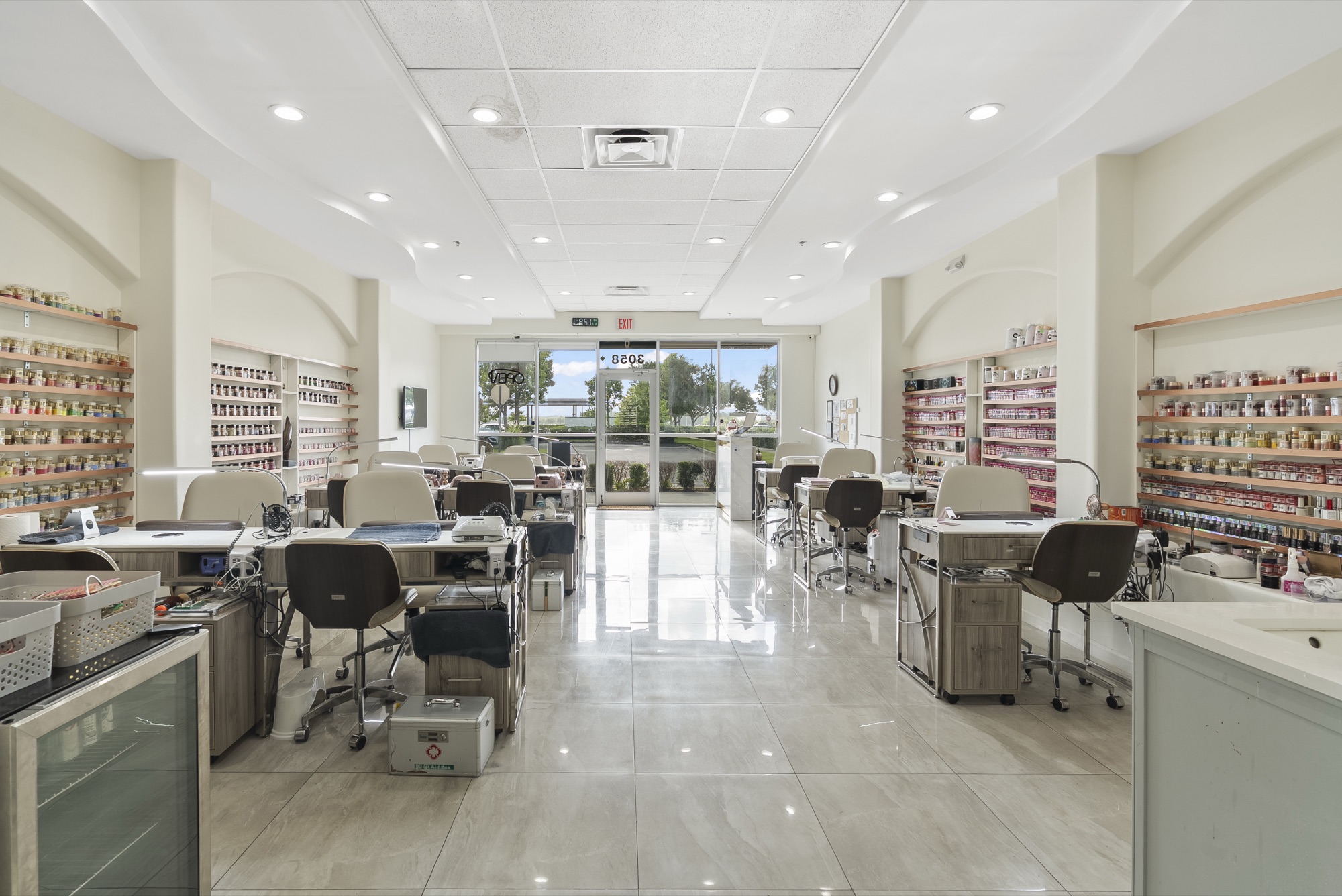 Manicure tables facing the entrance
