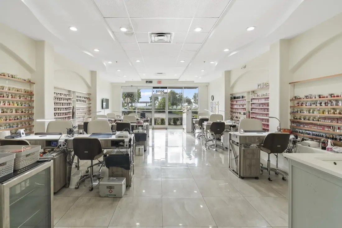 Manicure stations inside Trust Nails & Spa in Kissimmee