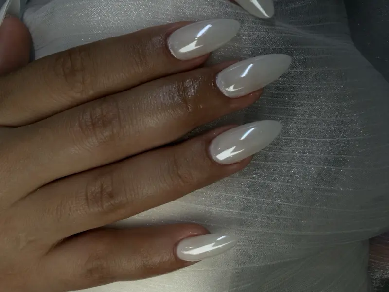 Almond long nails in glossy milky white