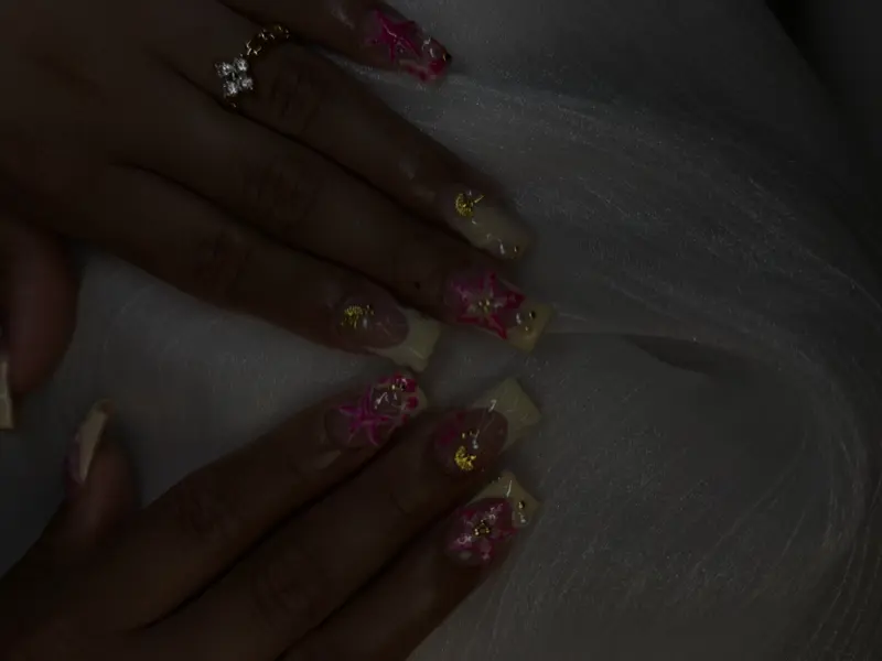Coffin long nails with 3D floral nude and star nail art
