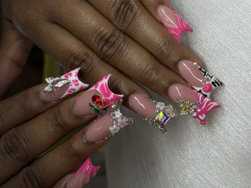 Coffin long nails with 3D pink charms and bling