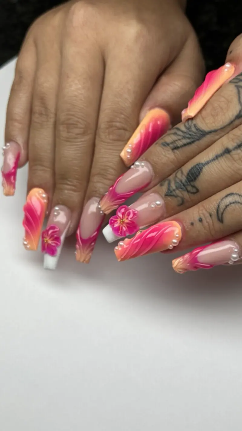 Coffin long nails with airbrushed pink and orange 3D floral nail art